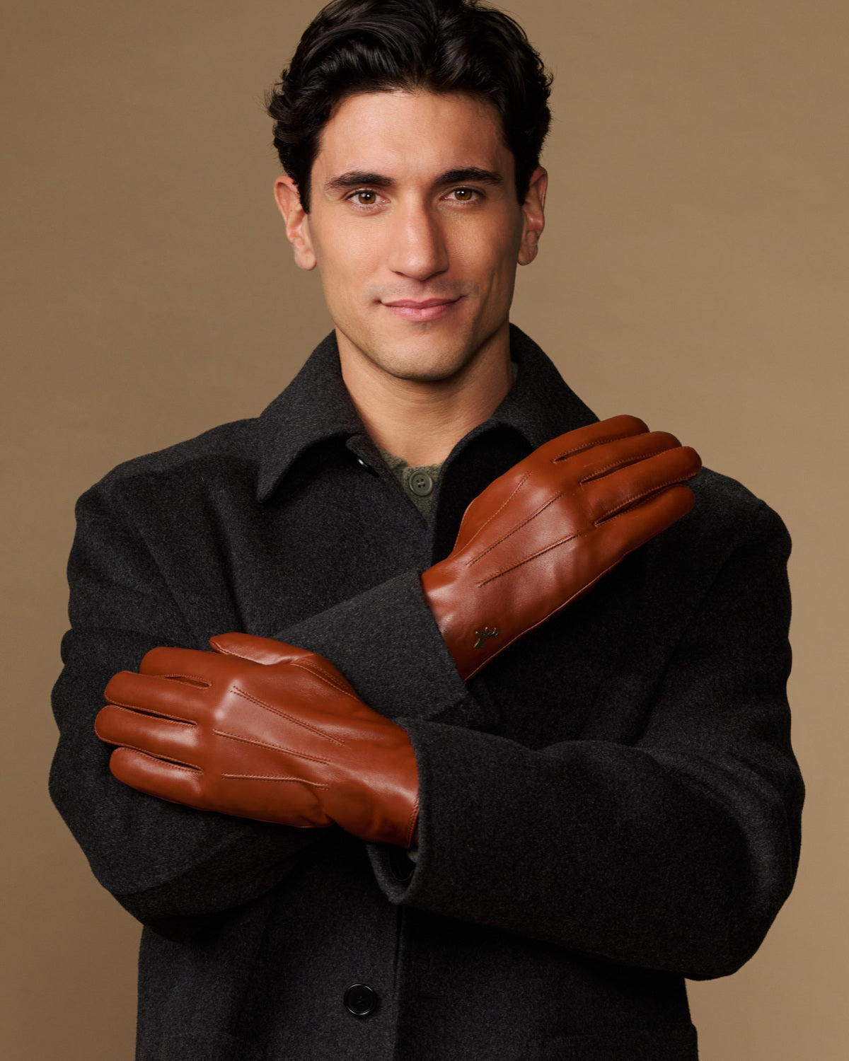 Men's lambskin leather gloves in dark brown with plush fur lining and touchscreen tips