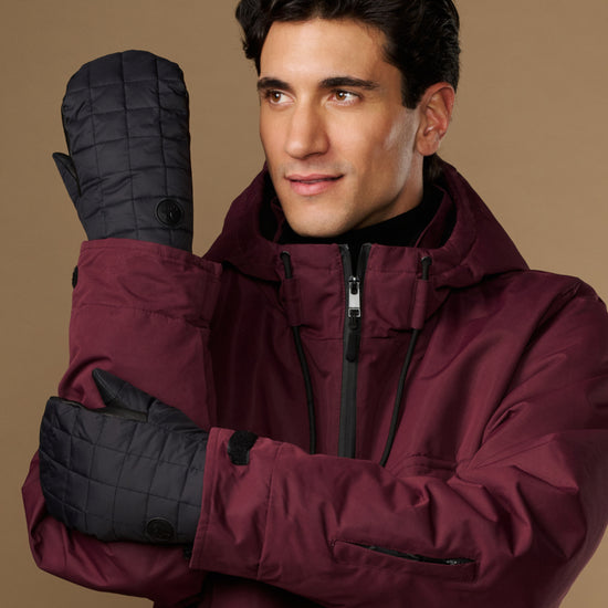 Black quilted mittens with extended cuffs, shown from the front and back.