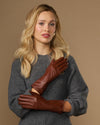 Extra-long cognac leather gloves with stitched wrist and hand-seam panels