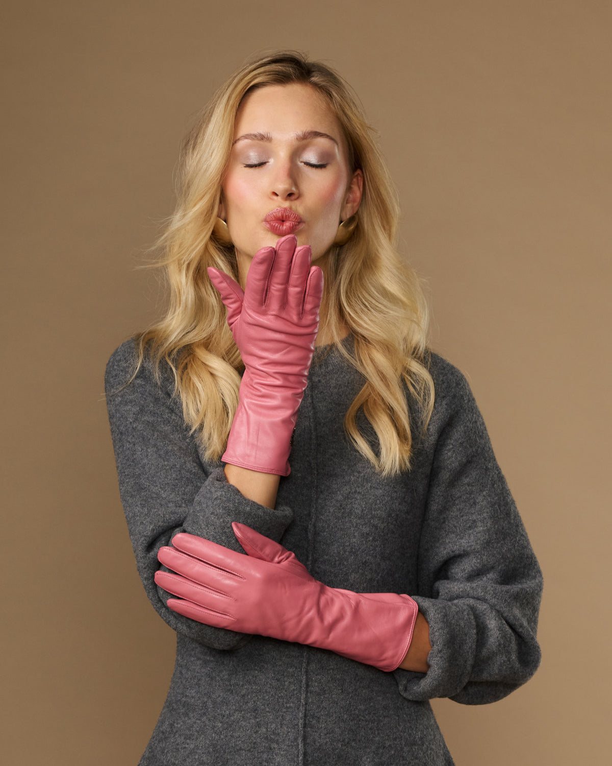 Pink leather gloves with long cuffs and touchscreen fingertips, snug knit-like fit
