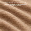 Cashmere lining texture in a soft beige interior of a glove