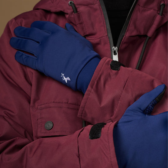 Blue activity gloves with smooth backs and small white logo