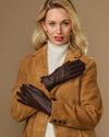 Brown fleece-lined leather gloves crossed at chest, front view