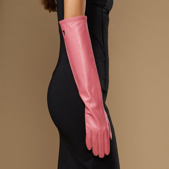 Pink lambskin elbow gloves with long fitted cuffs and smooth leather finish
