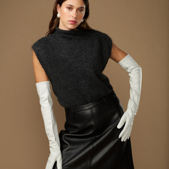 Women's white leather gloves with long cuffs and seamless finger shape