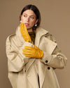 Yellow deerskin leather gloves with stitched finger panels and shaped wrist cuff